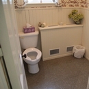 Salle de toilette mixte partiellement accessible