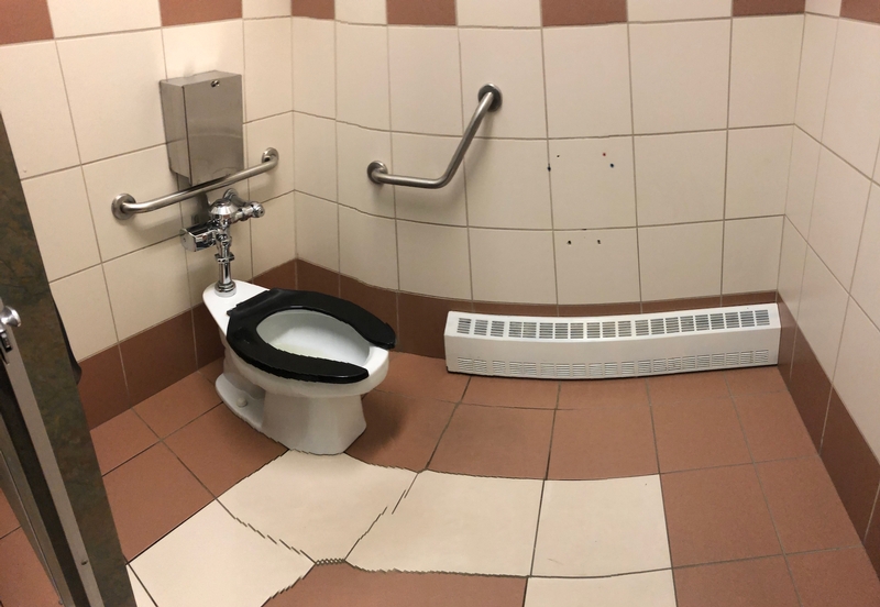 Cabinet de toilette hommes de la gare fluviale de Tadoussac